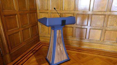 Prosecutor won’t file criminal charges over purchase of $19K lectern by Arkansas governor’s office