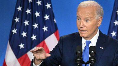Democrats keep piling on as Biden stands firm