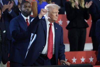 Donald Trump - Mike Johnson - Tucker Carlson - Byron Donalds - Alex Woodward - Trump makes dramatic appearance at RNC just days after being shot during assassination attempt - independent.co.uk - Usa - state Pennsylvania - state Ohio - state Wisconsin