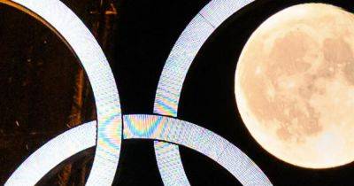Eiffel Tower And Moon Put On Olympically Spectacular Display Ahead Of Games