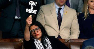Rep. Rashida Tlaib Protests Netanyahu Speech With 'War Criminal' Sign