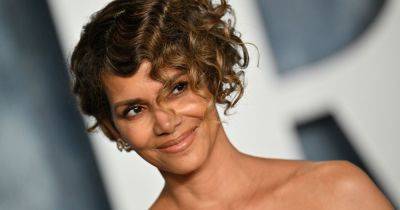 Halle Berry Goes Topless With Cats To Celebrate 20th Anniversary Of ‘Catwoman’