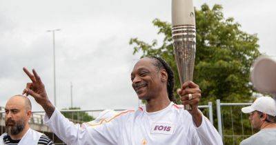 Snoop Dogg Carries Olympic Torch In Paris, Sets Internet Ablaze With Memes
