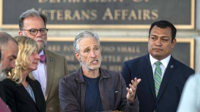 Joe Biden - Tara Copp - Jon Stewart - Jon Stewart pushes VA to cover troops sickened by uranium after 9/11. Again, they are told to wait - apnews.com - Washington - Afghanistan - state Oregon