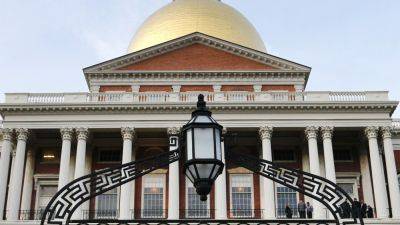 Massachusetts lawmaker pass -- and pass on -- flurry of bills in final hours of formal session
