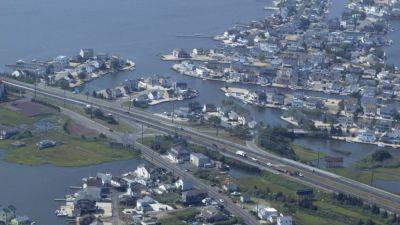 Protecting against floods, or a government-mandated retreat from the shore? New Jersey rules debated