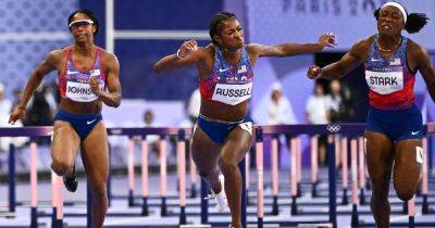 Masai Russell Of U.S. Wins 100 Hurdles In Tight Finish At Paris Olympics