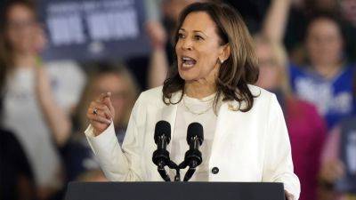 Donald Trump - Kamala Harris - Tim Walz - The Latest: Harris and Trump paint different pictures for voters as the White House intensifies - apnews.com - Usa - state Minnesota - Los Angeles