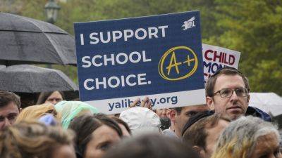 Millions of campaign dollars aimed at tilting school voucher battle are flowing into state races