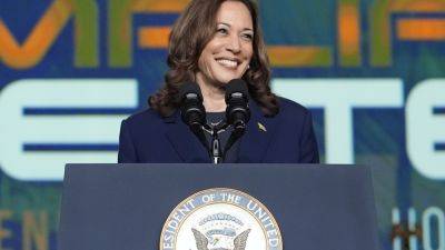 Donald Trump - Kamala Harris - Rachel Scott - Election 2024 Latest: Trump on defense after race comments and Vance’s rough launch - apnews.com - Usa - state Pennsylvania - India - city Chicago