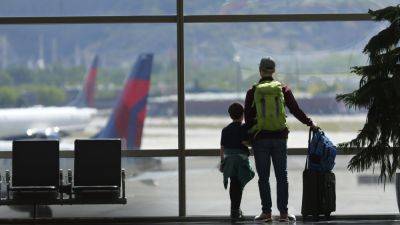 Proposed US rule would ban airlines from charging parents additional fees to sit with their children