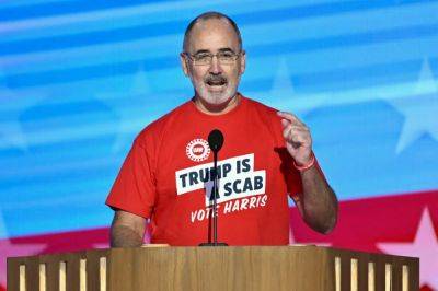 Donald Trump - Kamala Harris - Alex Woodward - Shawn Fain - UAW president has his Hulk Hogan moment at DNC with ‘Trump is a scab’ t-shirt - independent.co.uk - Usa - state Ohio - city Chicago