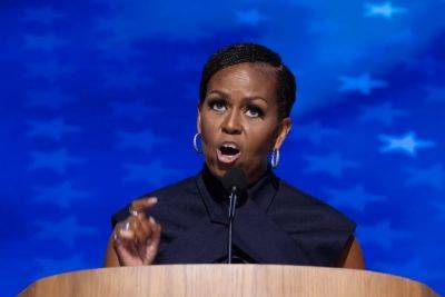 Joe Biden - Donald Trump - Kamala Harris - Barack Obama - Michelle Obama - Simone Biles - Andrew Feinberg - Tim Walz - ‘Who’s gonna tell him?’ Michelle Obama eviscerates Trump’s ‘Black jobs’ remark in DNC speech for Harris - independent.co.uk - Usa - city Chicago