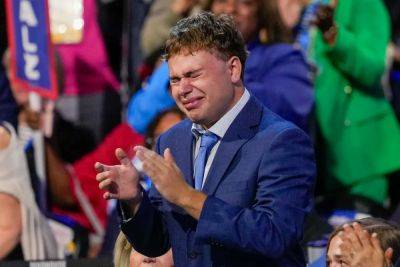 Tim Walz - James Liddell - Gus Walz - Heartwarming moment Gus Walz tearfully cheers on Tim at DNC: ‘That’s my dad’ - independent.co.uk - state Minnesota