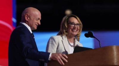 Mark Kelly - Gabby Giffords - Alana Wise - Gabby Giffords recounts her own shooting in DNC remarks - npr.org - state Arizona - city Chicago