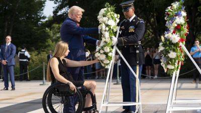 Joe Biden - Donald Trump - Kamala Harris - Tulsi Gabbard - THOMAS BEAUMONT - Trump rebukes Harris and Biden on anniversary of Afghanistan bombing that killed 13 service members - apnews.com - Usa - Afghanistan - state Michigan - city Detroit