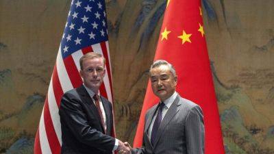 Joe Biden - Xi Jinping - Jake Sullivan - Wang Yi - A top White House official says US and China are working to avoid conflict at talks in Beijing - apnews.com - Usa - China - city Beijing - Pakistan - Canada