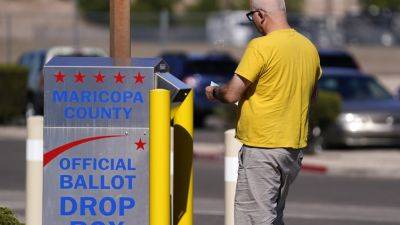 Adrian Fontes - Kris Mayes - Action - Conservative group plans to monitor voting drop box locations in Arizona - apnews.com - state Arizona - county Maricopa