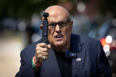 Trump - Rudy Giuliani - Alex Woodward - Shaye Moss - Election workers Giuliani defamed go after his luxury condo and World Series rings after $148 million verdict - independent.co.uk - Georgia - city New York - New York