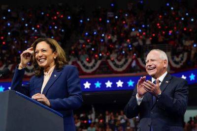 Donald Trump - Kamala Harris - Alex Woodward - Tim Walz - Kamala Harris and running mate Tim Walz take the stage at packed Philadelphia rally - independent.co.uk - Usa - state Minnesota - county Harris - Philadelphia, county Harris - county Vance