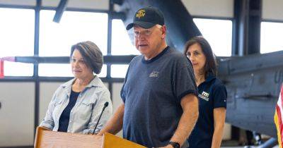 Tim Walz Seeks to Build Trust, One T-shirt at a Time