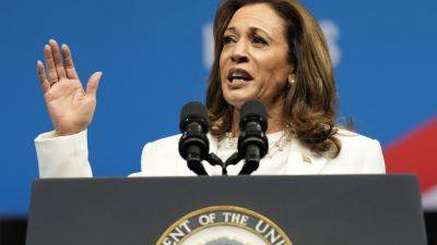 Joe Biden - Donald Trump - Kamala Harris - Harris calls Trump’s appearance at Arlington a ‘political stunt’ that ‘disrespected sacred ground’ - apnews.com - Usa - Afghanistan - state Indiana - county Harris