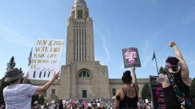 Nebraska ballot can include competing measures to expand or limit abortion rights, high court rules