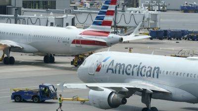 American Airlines flight attendants ratify contract that ends their threats to go on strike