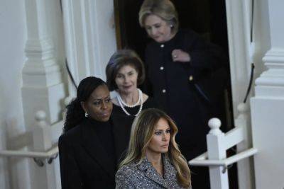 Donald Trump - Hillary Clinton - George W.Bush - Melania Trump - Bill Clinton - James Liddell - Hillary Clinton says Melania Trump was like a ‘little kid’ in awkward meeting last year - independent.co.uk - Georgia - state Florida - county Carter