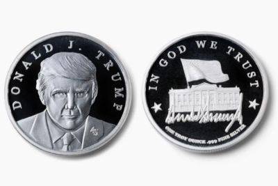 Donald Trump - Gustaf Kilander - Lee Greenwood - No cents of shame: Trump unveils new commemorative coin for $100 in latest merchandise grab - independent.co.uk - Usa