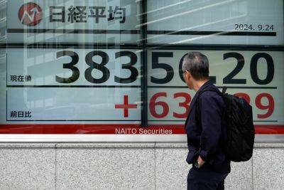 Elaine Kurtenbach - Stock market today: Asian shares gain as China eases rates to aid property industry - independent.co.uk - China - city Beijing - Australia - city Seoul - Hong Kong - city Shanghai - city Tokyo - city Hong Kong