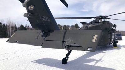 U.S.District - MICHAEL CASEY - A snowmobiler who crashed into a parked Black Hawk helicopter is awarded $3 million - apnews.com - New York - state Massachusets - city Boston - county Smith