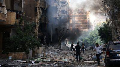 Israel strikes Beirut suburb, Nasrallah's fate unclear after Friday's massive attack