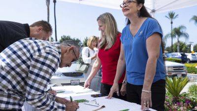 Conservative Christians were skeptical of mail-in ballots. Now they are gathering them in churches