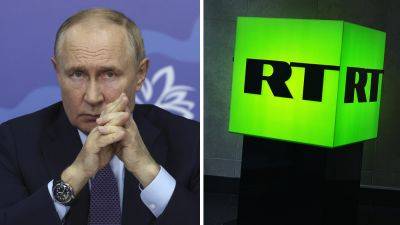 2 Russia-based RT employees indicted by US, internet domains seized in election influence probe