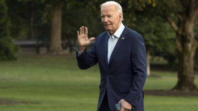 Biden set to sign an order to prioritize federal grants for projects with higher worker wages and benefits